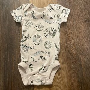 Cream color boys onesie with animals